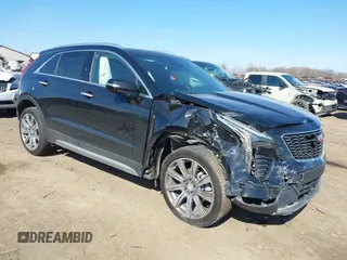 2023 Cadillac XT4 AWD Premium Luxury with VIN 1GYFZDR46PF195391, listed as a IAAI auction lot 41848429 with 31,904 mi miles and . Bid and sale history available at carsss.com. Image 1.
