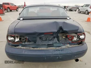 1994 Mazda MX-5 Miata with VIN JM1NA3537R0512679, listed as a Copart auction lot 45649075 with 126,476 mi miles and Salvage title. Bid and sale history available at DreamBid. Image 6.