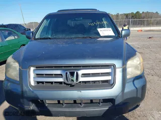 2006 Honda Pilot EX-L with VIN 5FNYF18516B002860, listed as a IAAI auction lot 41355134 with 202,797 mi miles. Bid and sale history available at carsss.com. Image 6.