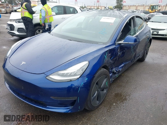 2020 Tesla Model 3 Standard Range Plus with VIN 5YJ3E1EAXLF644679, listed as a IAAI auction lot 41500595 with 53,726 mi miles and . Bid and sale history available at DreamBid. Image 19.