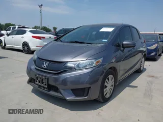 2015 Honda Fit LX with VIN 3HGGK5H55FM724750, listed as a IAAI auction lot 42282137 with 32,696 mi miles and . Bid and sale history available at DreamBid. Image 2.