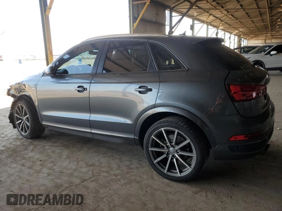 2018 Audi Q3 Premium with VIN WA1ECCFS8JR021306, listed as a Copart auction lot 60091415 with 100,604 mi miles and Salvage title. Bid and sale history available at DreamBid. Image 2.
