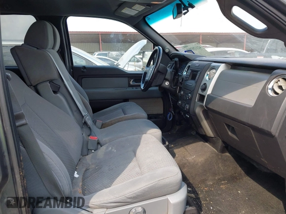 2014 Ford F-150 XL with VIN 1FTFW1CTXEKF35966, listed as a IAAI auction lot 42120360 with 140,174 mi miles and . Bid and sale history available at DreamBid. Image 5.