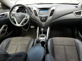 2013 Hyundai Veloster w/Gray Int z VIN KMHTC6AD9DU110094, wystawiony jako Copart lot #64660645 z przebiegiem 149 746 mil mil oraz Szkoda całkowita • Salvage title. Historia ofert i sprzedaży dostępna na DreamBid. Obrazek 8.