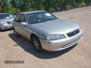 2000 Toyota Camry CE z VIN JT2BG22K3Y0531311, wystawiony jako IAAI lot #42222389 z przebiegiem 180 982 mil mil oraz . Historia ofert i sprzedaży dostępna na DreamBid. Obrazek 1.