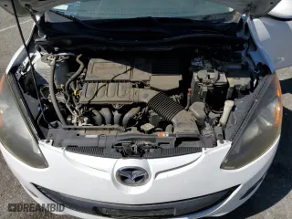 2011 Mazda Mazda2 Sport with VIN JM1DE1HZXB0101951, listed as a Copart auction lot 68288974 with 97,437 mi miles and Salvage Title. Bid and sale history available at carsss.com. Image 12.