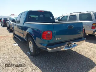 2001 Ford F-150 XLT with VIN 1FTRW07W01KA75819, listed as a IAAI auction lot 42293859 with 156,137 mi miles and . Bid and sale history available at DreamBid. Image 3.