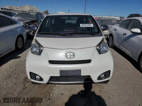 2015 Scion iQ with VIN JTNJJXB09FJ030846, listed as a Copart auction lot 88353405 with 72,208 mi miles and Salvage Title. Bid and sale history available at carsss.com. Image 5.