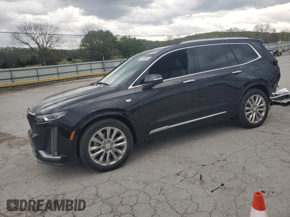 2021 Cadillac XT6 Premium Luxury z VIN 1GYKPCRS1MZ169952, wystawiony jako Copart lot #51908895 z przebiegiem 31 834 mil mil oraz Szkody całkowita. Historia ofert i sprzedaży dostępna na DreamBid. Obrazek 1.