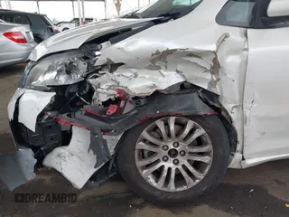 2015 Toyota Sienna XLE with VIN 5TDYK3DC5FS640102, listed as a IAAI auction lot 41885194 with 119,972 mi miles. Bid and sale history available at carsss.com. Image 17.