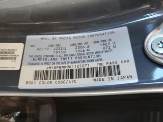 2019 Mazda Mazda3 Hatchback w/Premium Pkg with VIN JM1BPBNM9K1125071, listed as a Copart auction lot 86589954 with 63,157 mi miles and Salvage Title. Bid and sale history available at carsss.com. Image 12.