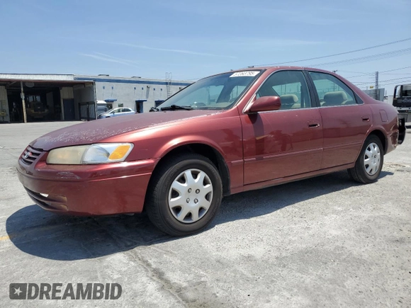 1999 Toyota Camry LE z VIN JT2BG22K6X0274398, wystawiony jako Copart lot #57263795 z przebiegiem 202 944 mil mil oraz Szkoda całkowita • Salvage title. Historia ofert i sprzedaży dostępna na DreamBid. Obrazek 1.
