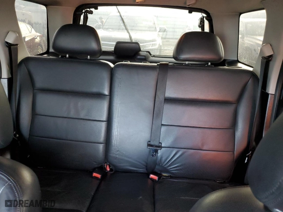 2007 Ford Escape Limited with VIN 1FMYU04107KA09821, listed as a Copart auction lot 87005094 with 151,897 mi miles and Salvage Title. Bid and sale history available at carsss.com. Image 10.