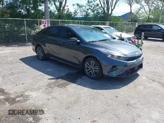 2023 Kia Forte GT-Line z VIN 3KPF54AD6PE602195, wystawiony jako IAAI lot #42280172 z przebiegiem 28 289 mil mil oraz . Historia ofert i sprzedaży dostępna na DreamBid. Obrazek 1.