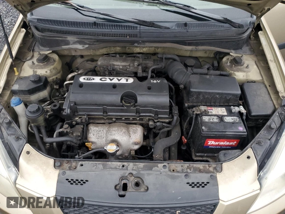 2009 Kia Rio LX with VIN KNADE223096485561, listed as a Copart auction lot 73412874 with 137,858 mi miles and Salvage Title. Bid and sale history available at DreamBid. Image 11.