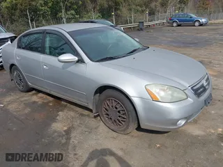 2003 Nissan Altima S with VIN 1N4AL11D23C290009, listed as a IAAI auction lot 41813061 with 247,427 mi miles. Bid and sale history available at carsss.com. Image 1.
