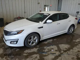 2015 Kia Optima LX z VIN KNAGM4A77F5612212, wystawiony jako Copart lot #60791665 z przebiegiem 186 433 mil mil oraz Czysty tytuł • Clean title. Historia ofert i sprzedaży dostępna na DreamBid. Obrazek 1.