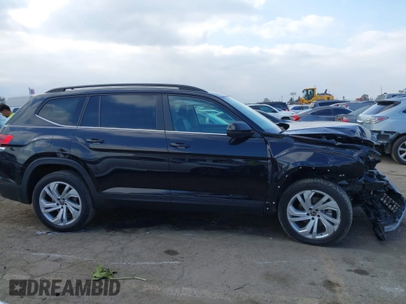 2021 Volkswagen Atlas SE z VIN 1V2WR2CAXMC558294, wystawiony jako IAAI lot #41447619 z przebiegiem 48 652 mil mil oraz . Historia ofert i sprzedaży dostępna na DreamBid. Obrazek 13.