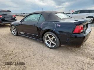 2001 Ford Mustang GT Deluxe with VIN 1FAFP45X31F148246, listed as a Copart auction lot 63087385 with 114,051 mi miles and Salvage title. Bid and sale history available at DreamBid. Image 2.