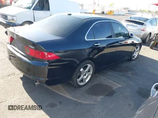 2006 Acura TSX with VIN JH4CL96896C006942, listed as a IAAI auction lot 42262503 with 228,399 mi miles and . Bid and sale history available at DreamBid. Image 4.
