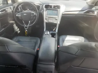 2018 Ford Fusion SE z VIN 3FA6P0LU6JR273861, wystawiony jako Copart lot #55722005 z przebiegiem 127 633 mil mil oraz Szkoda całkowita • Salvage title. Historia ofert i sprzedaży dostępna na DreamBid. Obrazek 8.