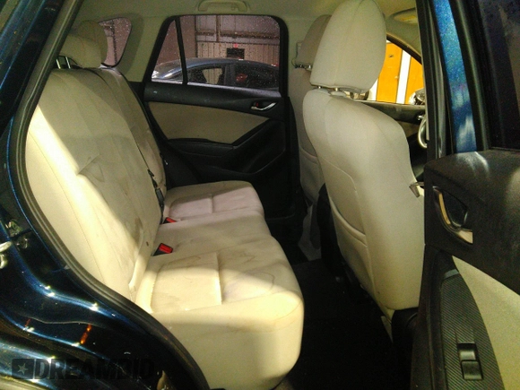 2016 Mazda CX-5 Sport with VIN JM3KE2BY5G0782385, listed as a IAAI auction lot 41971163 with 87,251 mi miles. Bid and sale history available at carsss.com. Image 8.