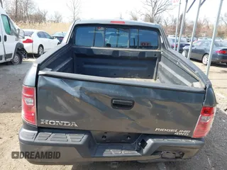 2011 Honda Ridgeline RT z VIN 5FPYK1F26BB453191, wystawiony jako IAAI lot #41776280 z przebiegiem 122 908 mil mil oraz . Historia ofert i sprzedaży dostępna na DreamBid. Obrazek 16.