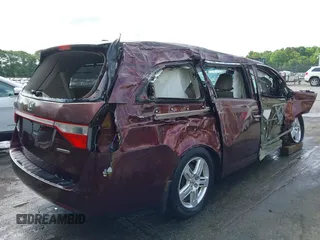 2012 Honda Odyssey Touring z VIN 5FNRL5H98CB035454, wystawiony jako IAAI lot #42285987 z przebiegiem Nie podano mil oraz . Historia ofert i sprzedaży dostępna na DreamBid. Obrazek 13.