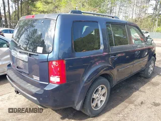 2010 Honda Pilot Touring with VIN 5FNYF4H80AB025356, listed as a IAAI auction lot 42029008 with 138,785 mi miles. Bid and sale history available at carsss.com. Image 4.