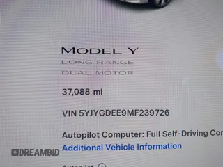 2021 Tesla Model Y Long Range with VIN 5YJYGDEE9MF239726, listed as a IAAI auction lot 41952158 with 37,088 mi miles and . Bid and sale history available at DreamBid. Image 7.