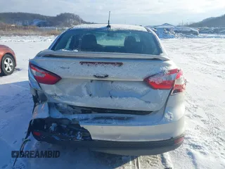 2012 Ford Focus SE with VIN 1FAHP3F27CL457213, listed as a IAAI auction lot 41303904 with 215,044 mi miles and . Bid and sale history available at DreamBid. Image 16.