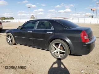 2006 Chrysler 300 C with VIN 2C3KA63H06H272552, listed as a Copart auction lot 72185684 with 105,737 mi miles and Salvage Title. Bid and sale history available at carsss.com. Image 2.