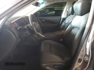 2010 Infiniti EX Journey with VIN JN1AJ0HP0AM702402, listed as a Copart auction lot 60933294 with 137,632 mi miles and Salvage Title. Bid and sale history available at DreamBid. Image 7.