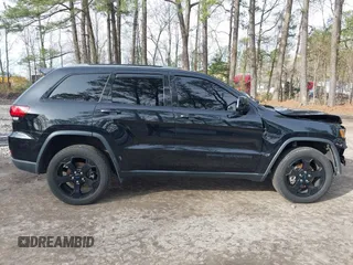 2018 Jeep Grand Cherokee Laredo E with VIN 1C4RJFAG1JC426542, listed as a IAAI auction lot 41729268 with 106,024 mi miles and . Bid and sale history available at DreamBid. Image 14.