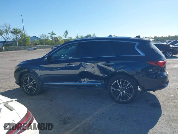 2016 Infiniti QX60 with VIN 5N1AL0MN4GC532048, listed as a IAAI auction lot 41832885 with 125,306 mi miles and . Bid and sale history available at DreamBid. Image 14.