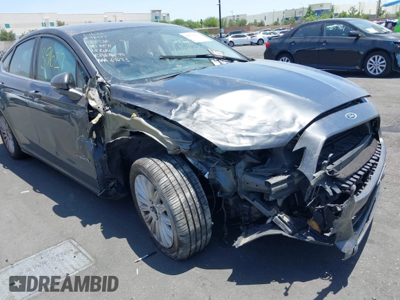 2015 Ford Fusion SE Hybrid with VIN 3FA6P0LU4FR305908, listed as a IAAI auction lot 42539627 with 91,467 mi miles and . Bid and sale history available at DreamBid. Image 6.
