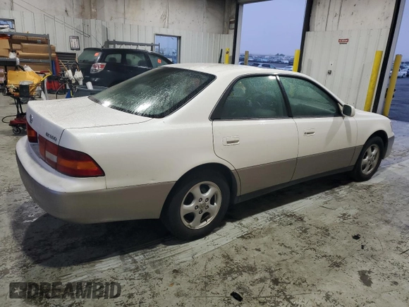 1999 Lexus ES 300 Luxury Sport Sdn with VIN JT8BF28G0X0233986, listed as a Copart auction lot 82440944 with 129,656 mi miles and Salvage Title. Bid and sale history available at carsss.com. Image 3.