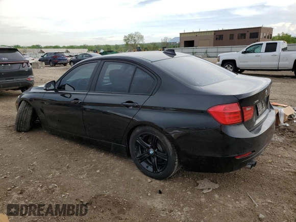 2013 BMW 3 Series 328i xDrive with VIN WBA3B3C5XDF540195, listed as a Copart auction lot 54256315 with 131,015 mi miles and Salvage title. Bid and sale history available at DreamBid. Image 2.