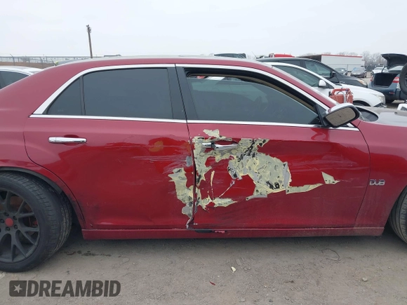 2012 Chrysler 300 C z VIN 2C3CCAET6CH160837, wystawiony jako IAAI lot #41450010 z przebiegiem 201 992 mil mil oraz . Historia ofert i sprzedaży dostępna na DreamBid. Obrazek 13.