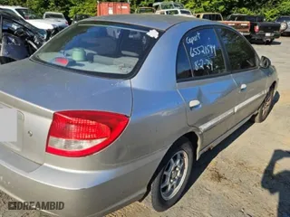 2004 Kia Rio with VIN KNADC125546325654, listed as a Copart auction lot 65521594 with 157,436 mi miles and Salvage Title. Bid and sale history available at carsss.com. Image 3.