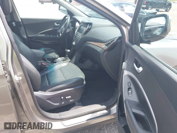 2018 Hyundai Santa Fe 2.0T с VIN 5NMZU4LAXJH057363, выставлен на аукционе IAAI как лот 42265981 с пробегом 118 536 миль миль и . История ставок и продаж доступна на DreamBid. Изображение 5.