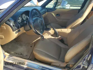 2002 Mazda MX-5 Miata Cloth z VIN JM1NB353720231873, wystawiony jako Copart lot #52398015 z przebiegiem 90 077 mil mil oraz Szkoda całkowita • Salvage title. Historia ofert i sprzedaży dostępna na DreamBid. Obrazek 7.