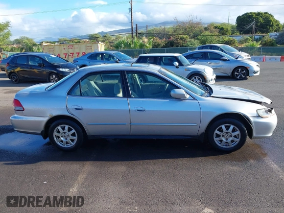 2002 Honda Accord SE with VIN 1HGCG56712A064900, listed as a IAAI auction lot 42184540 with Not provided miles and . Bid and sale history available at DreamBid. Image 13.