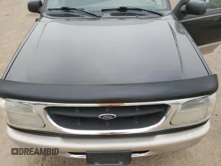 1998 Ford Explorer XL z VIN 1FMZU34E9WZB29566, wystawiony jako Copart lot #58847655 z przebiegiem 144 480 mil mil oraz Szkoda całkowita • Salvage title. Historia ofert i sprzedaży dostępna na DreamBid. Obrazek 11.