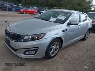 2014 Kia Optima LX with VIN 5XXGM4A71EG337837, listed as a IAAI auction lot 42251696 with 115,063 mi miles and . Bid and sale history available at DreamBid. Image 2.