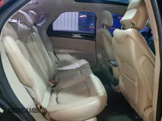 2013 Lincoln MKZ z VIN 3LN6L2G9XDR824879, wystawiony jako Copart lot #44733705 z przebiegiem 147 652 mil mil oraz Szkody całkowita. Historia ofert i sprzedaży dostępna na DreamBid. Obrazek 10.