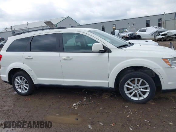 2017 Dodge Journey SXT z VIN 3C4PDCBG4HT531635, wystawiony jako IAAI lot #42460200 z przebiegiem 152 293 mil mil oraz . Historia ofert i sprzedaży dostępna na DreamBid. Obrazek 13.