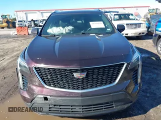 2020 Cadillac XT4 FWD Sport z VIN 1GYFZER40LF144503, wystawiony jako IAAI lot #41265649 z przebiegiem 79 120 mil mil oraz . Historia ofert i sprzedaży dostępna na DreamBid. Obrazek 12.