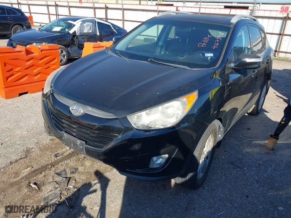 2013 Hyundai Tucson GLS with VIN KM8JU3AC7DU636203, listed as a IAAI auction lot 41673910 with 115,584 mi miles. Bid and sale history available at carsss.com. Image 2.