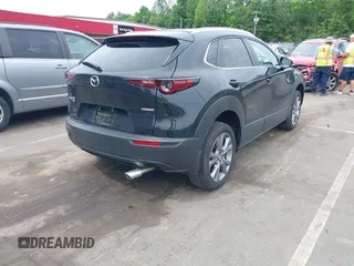 2024 Mazda CX-30 S Preferred z VIN 3MVDMBCM3RM663118, wystawiony jako IAAI lot #42336540 z przebiegiem 11 096 mil mil oraz . Historia ofert i sprzedaży dostępna na DreamBid. Obrazek 4.